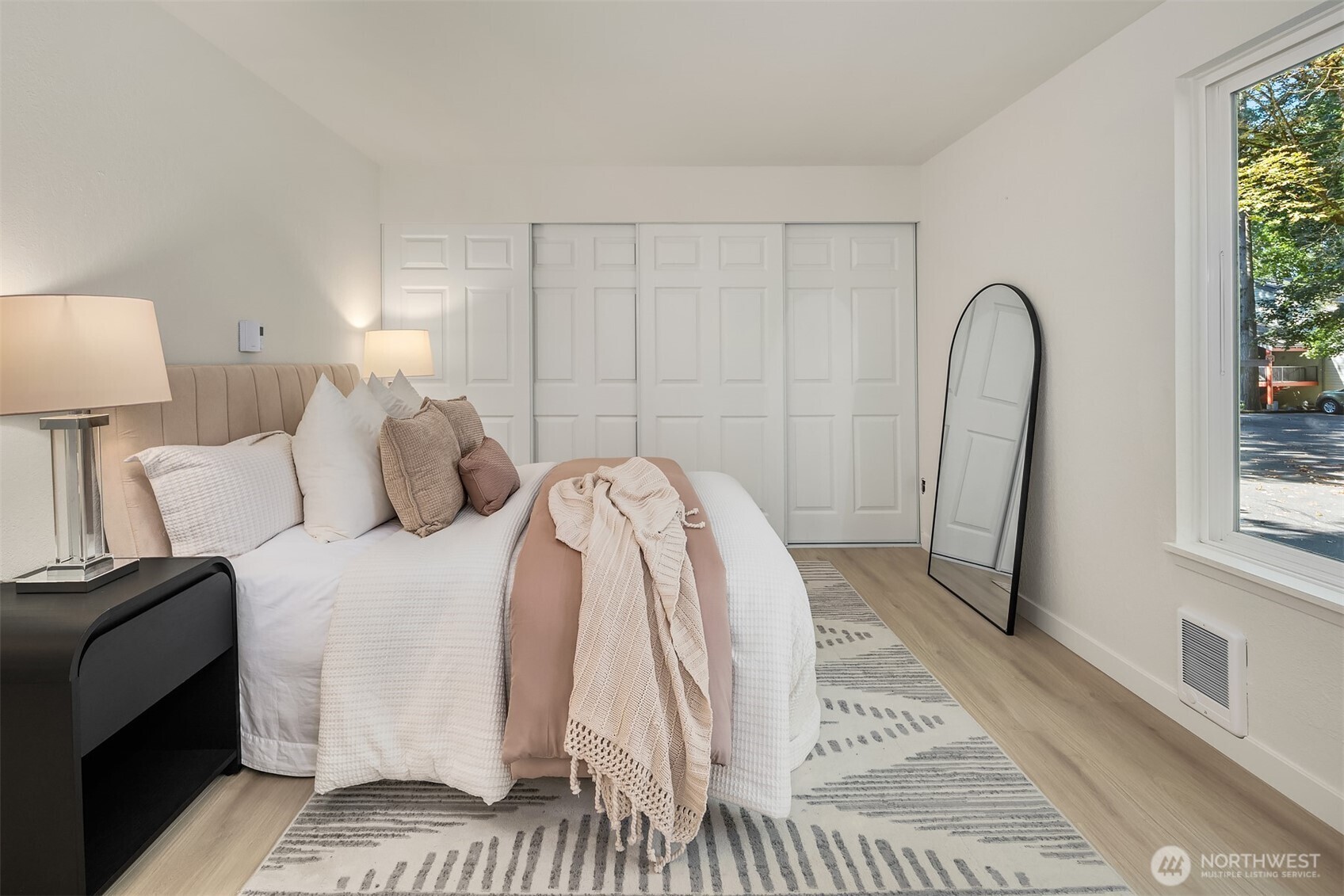 14415 Northeast 30th Place, Unit 22A Bellevue, WA 98007 - Photo 13 of 30 a living room with a bed furniture and a window