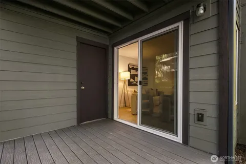 a view of a house with a tree