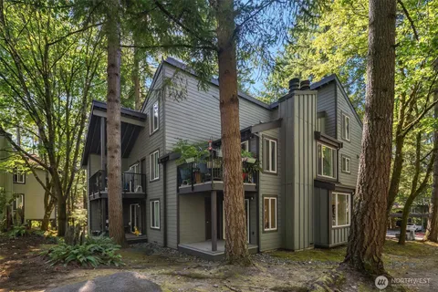 a view of balcony and with staircase