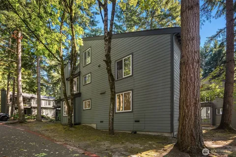 a view of a house with swimming pool