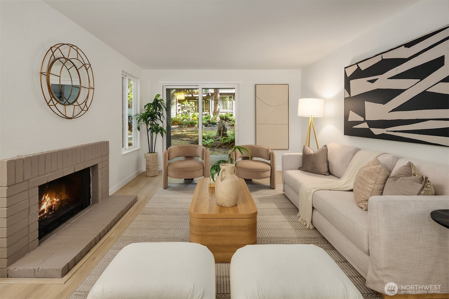 14415 Northeast 30th Place, Unit 22A Bellevue, WA 98007 - Photo 3 of 30 a living room with furniture a window and a fireplace