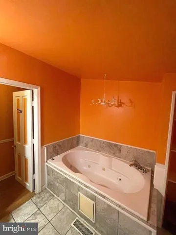 a bathroom with a bathtub