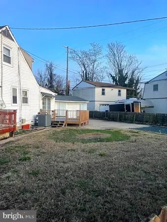 a view of a house with a back yard