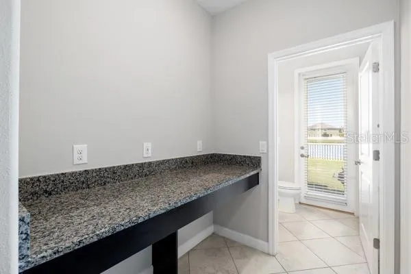 a view of a house with swimming pool and yard