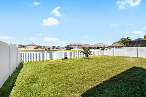 a view of a living room with a floor to ceiling window