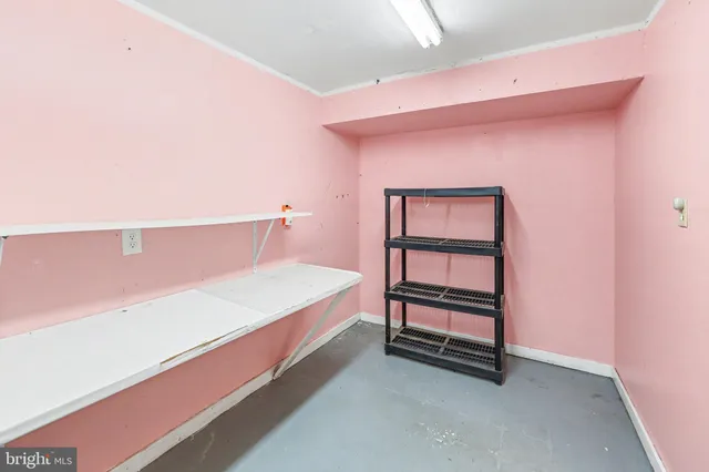 a bed room with a bed and a window