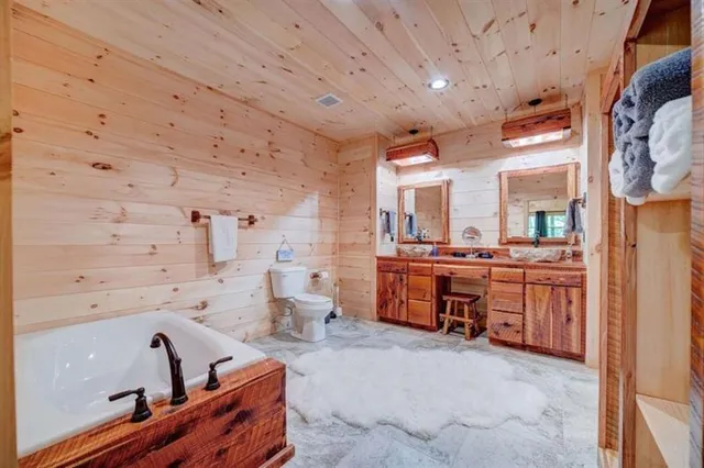 a kitchen with sink cabinets and stove