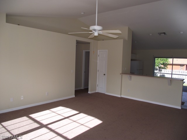 18485 Geranium Road Fort Myers, FL 33967 - Photo 7 of 9 a view of a chandelier fan