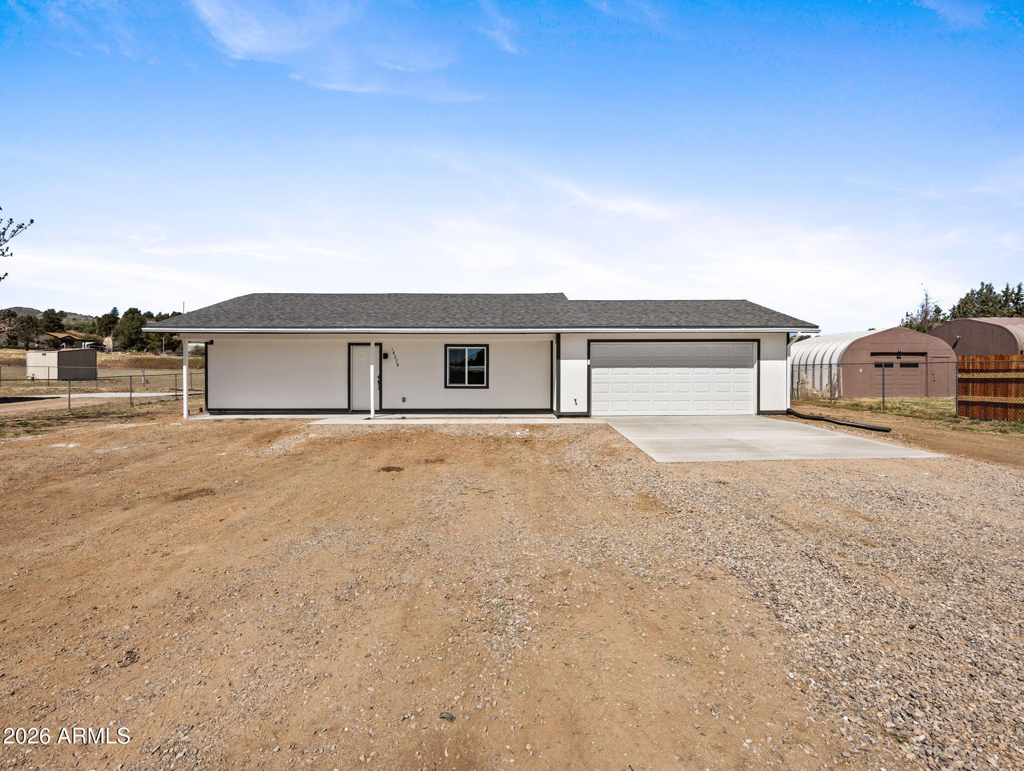 18278 Frontier Road Peeples Valley, AZ 86332 - Photo 7 of 31 a house view with a backyard