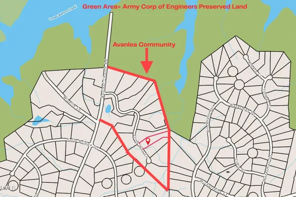 a view of a room with cabinets and a wooden floor