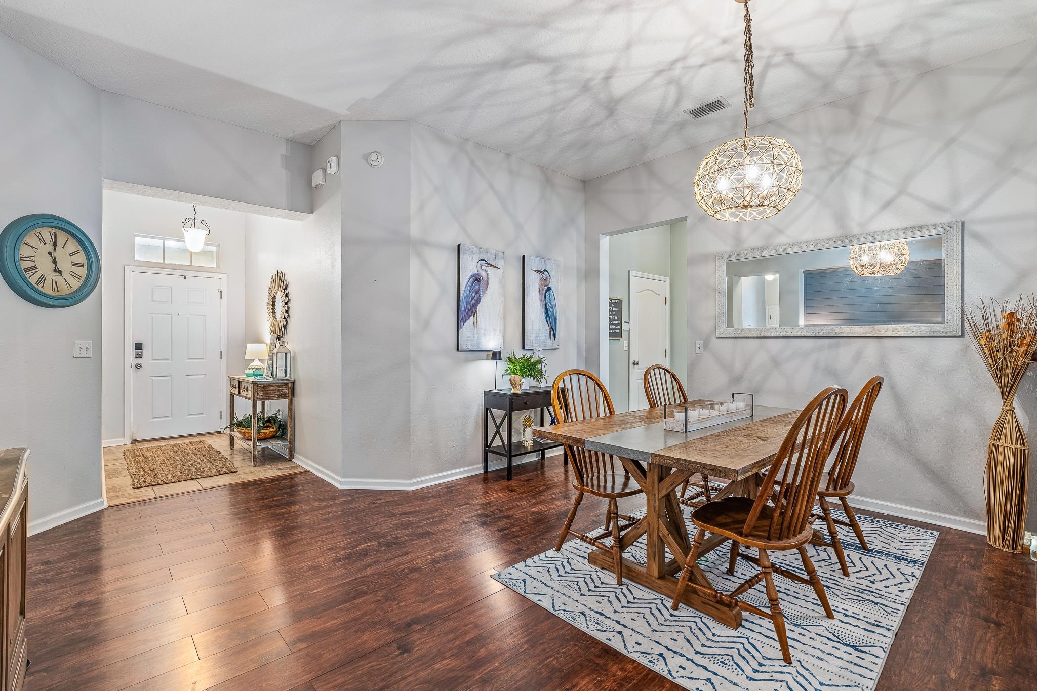 1353 Camp Ridge Lane Middleburg, FL 32068 - Photo 11 of 88 a view of a dining room with furniture and wooden floor
