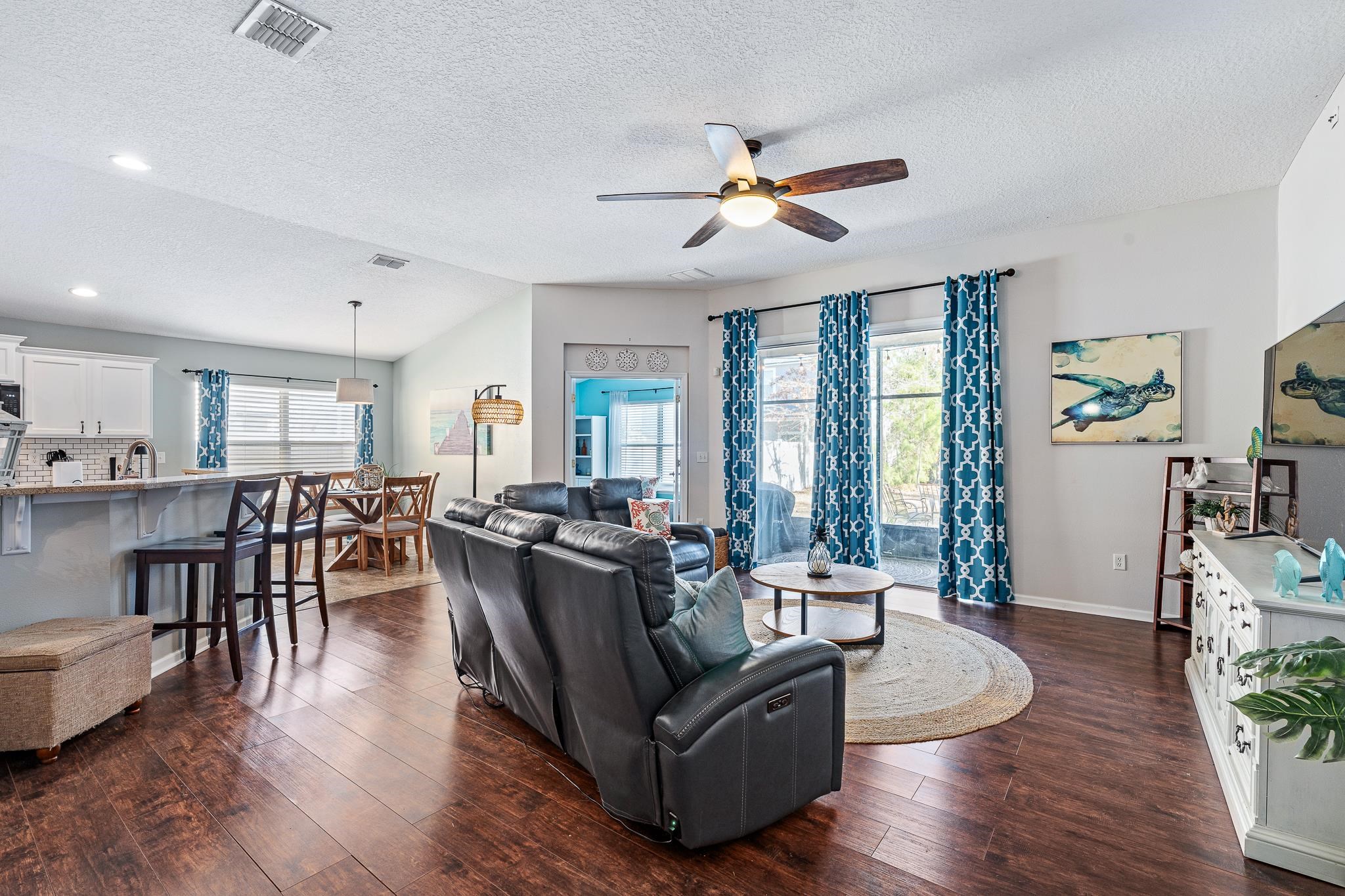 1353 Camp Ridge Lane Middleburg, FL 32068 - Photo 13 of 88 Living area featuring dark wood finished floors and ceiling fan