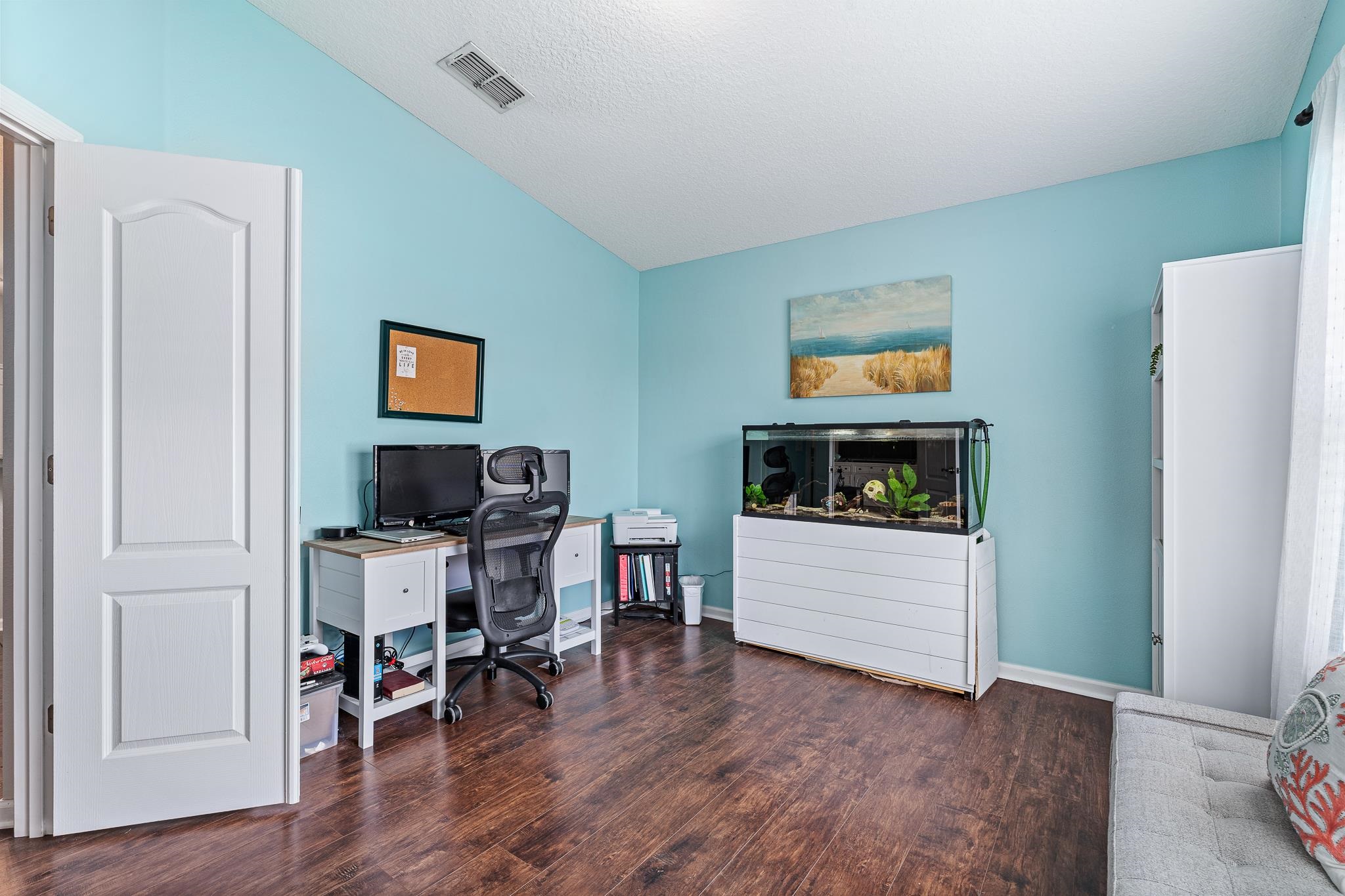 1353 Camp Ridge Lane Middleburg, FL 32068 - Photo 21 of 88 Office featuring vaulted ceiling and dark wood-style flooring