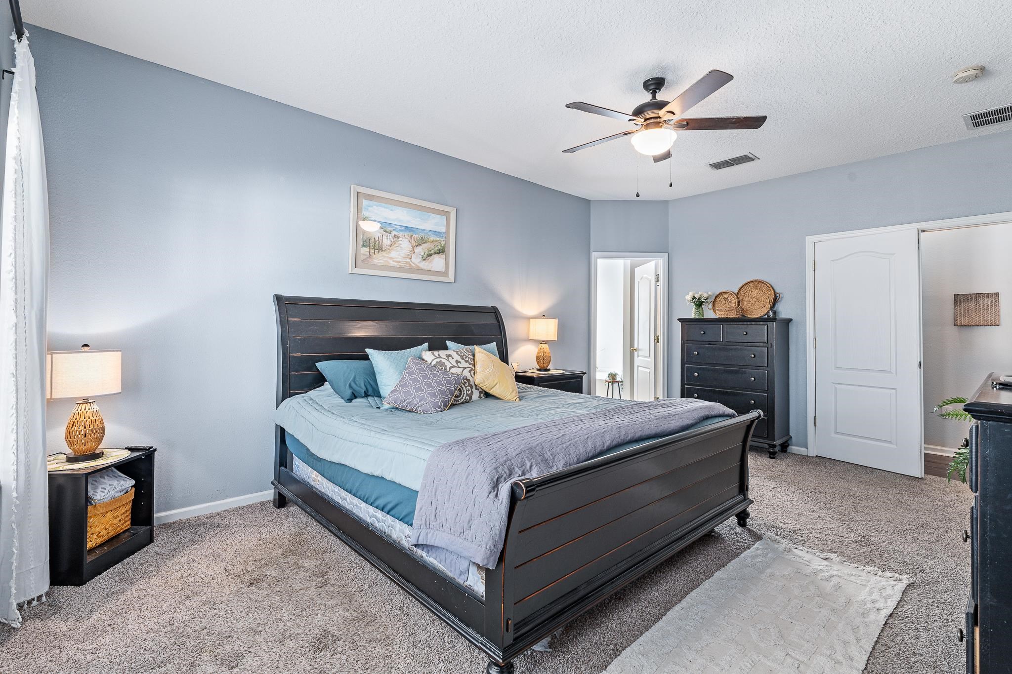 1353 Camp Ridge Lane Middleburg, FL 32068 - Photo 32 of 88 Carpeted bedroom with baseboards and ceiling fan