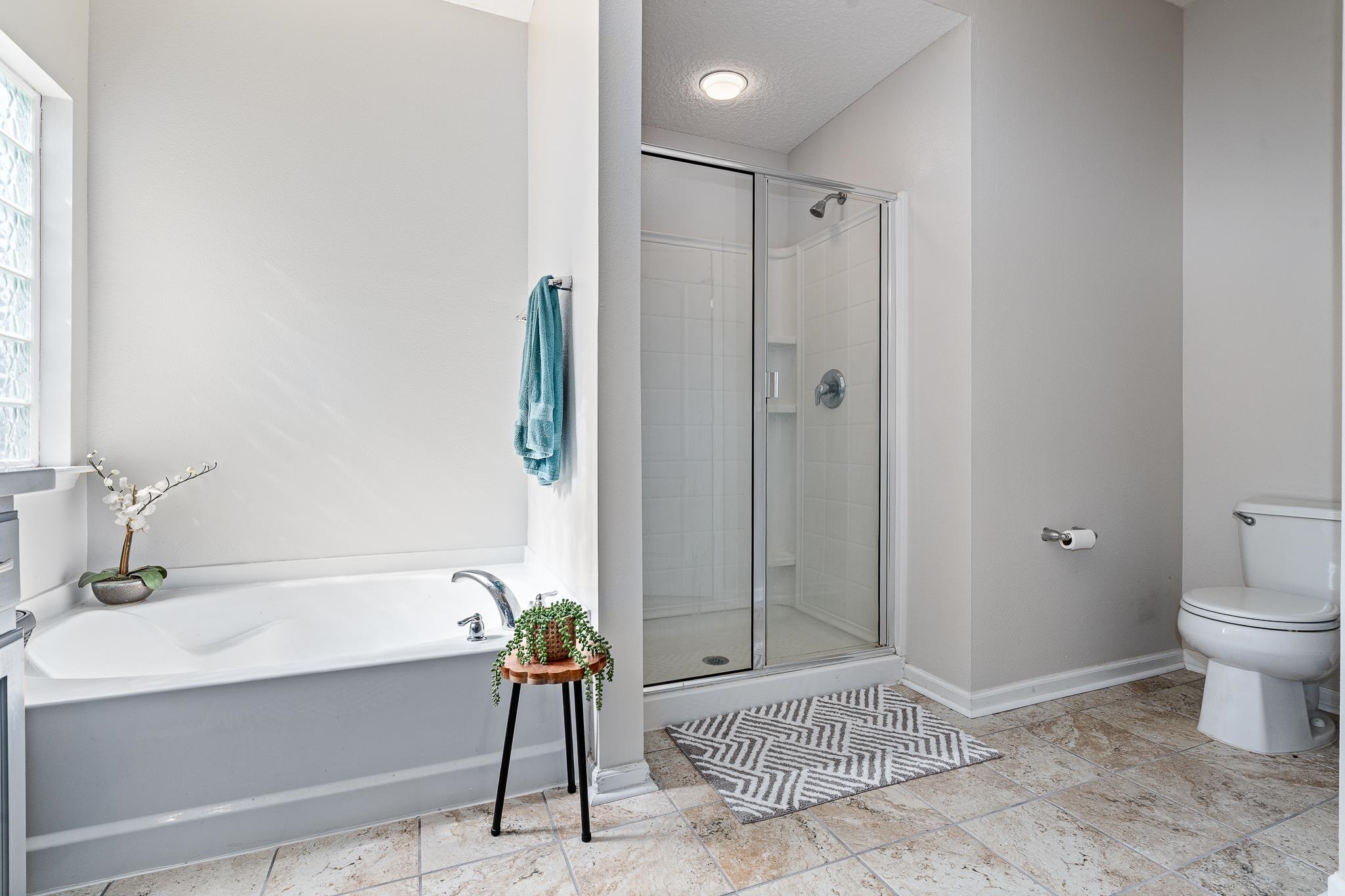 1353 Camp Ridge Lane Middleburg, FL 32068 - Photo 35 of 88 Full bathroom featuring a garden tub and a stall shower