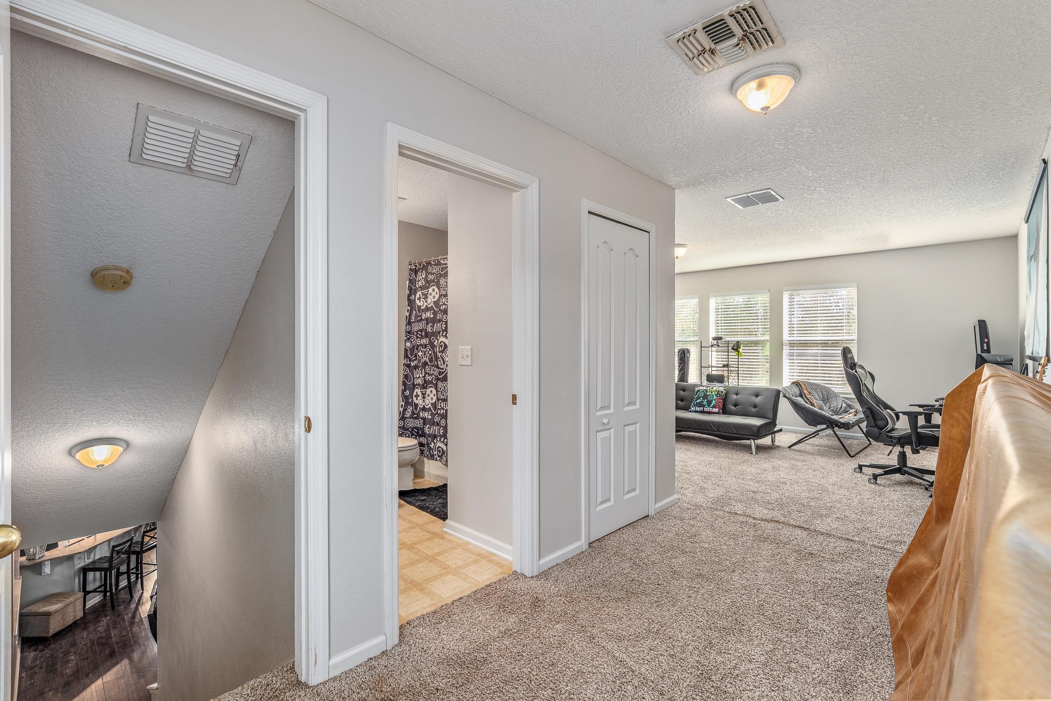 1353 Camp Ridge Lane Middleburg, FL 32068 - Photo 45 of 88 Home office featuring a textured ceiling and light colored carpet