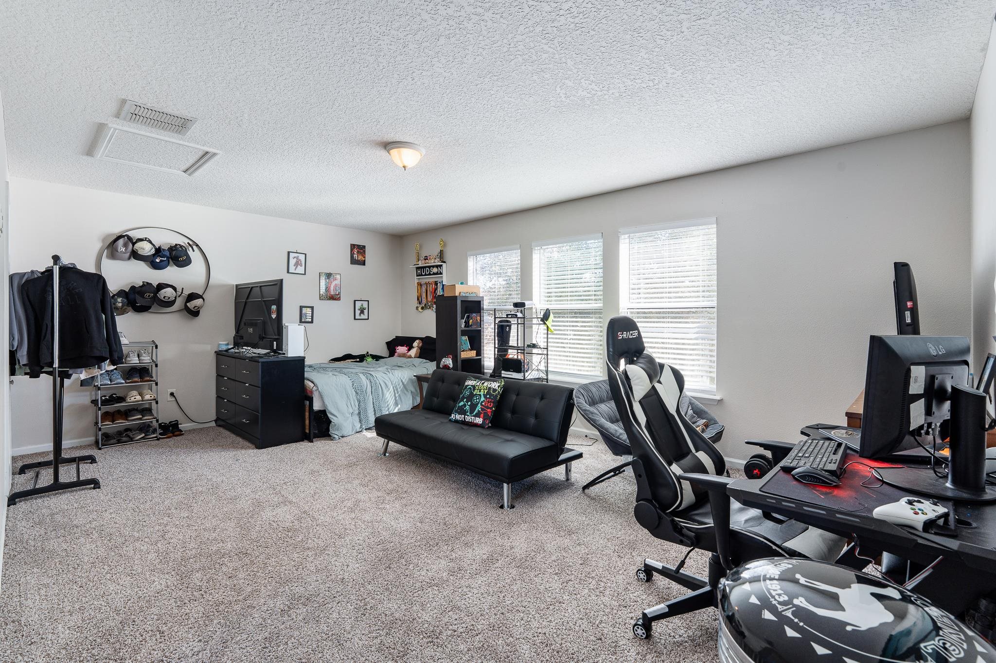 1353 Camp Ridge Lane Middleburg, FL 32068 - Photo 47 of 88 Home office with light carpet and a textured ceiling