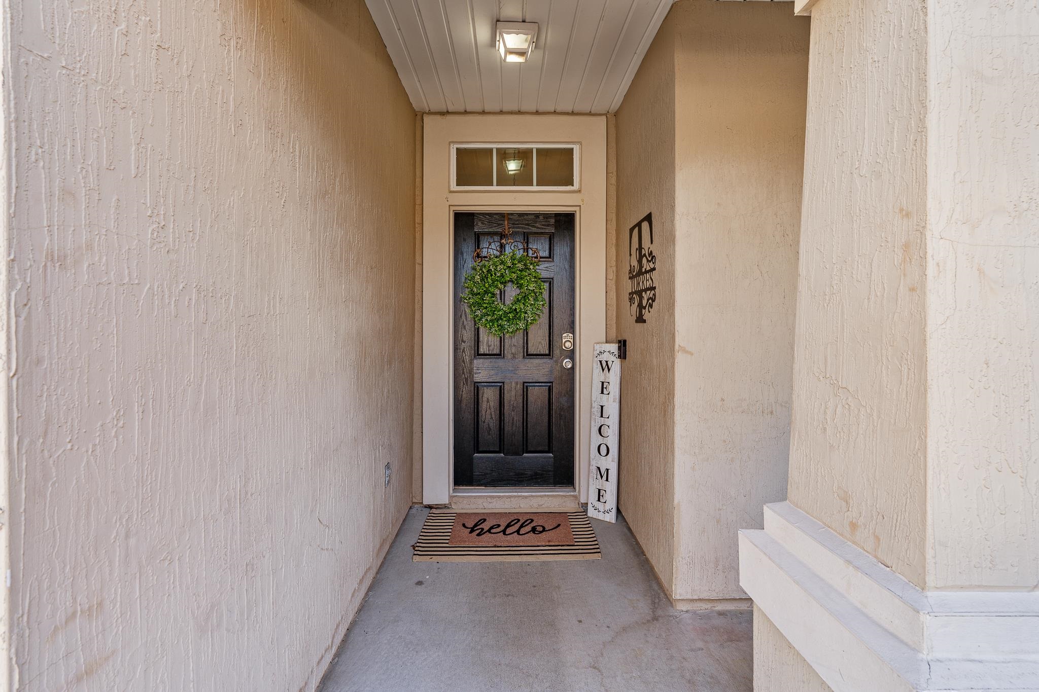 1353 Camp Ridge Lane Middleburg, FL 32068 - Photo 5 of 88 Property entrance with stucco siding