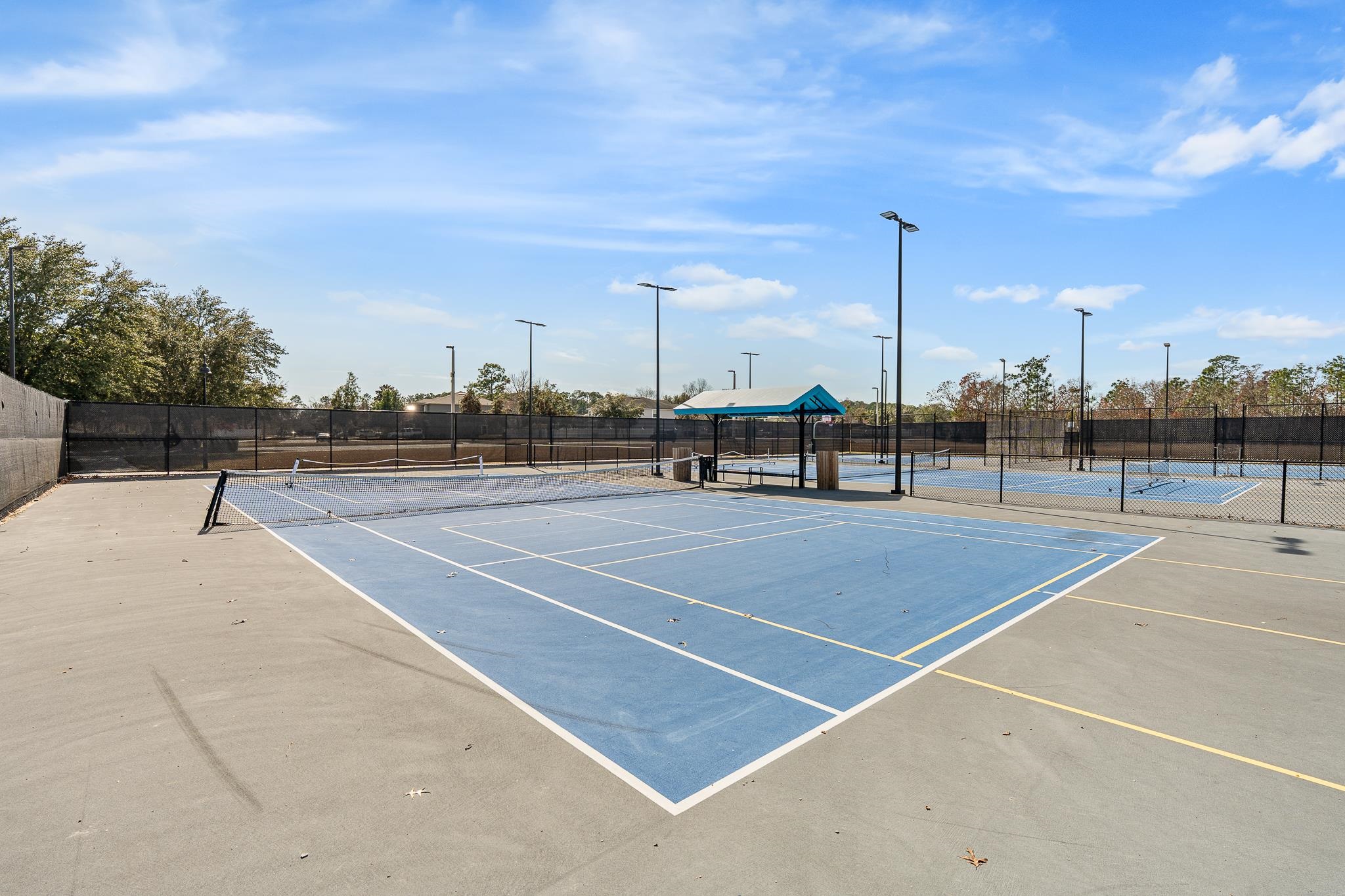 1353 Camp Ridge Lane Middleburg, FL 32068 - Photo 58 of 88 View of tennis court with community basketball court