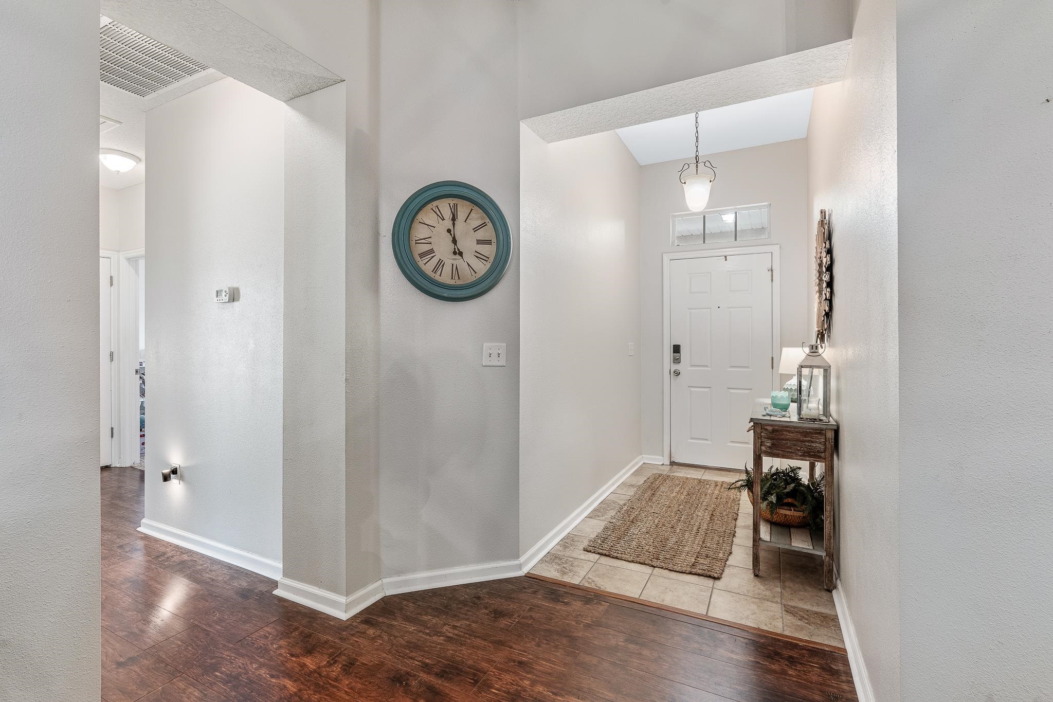 1353 Camp Ridge Lane Middleburg, FL 32068 - Photo 6 of 88 Foyer entrance featuring wood-type flooring and baseboards