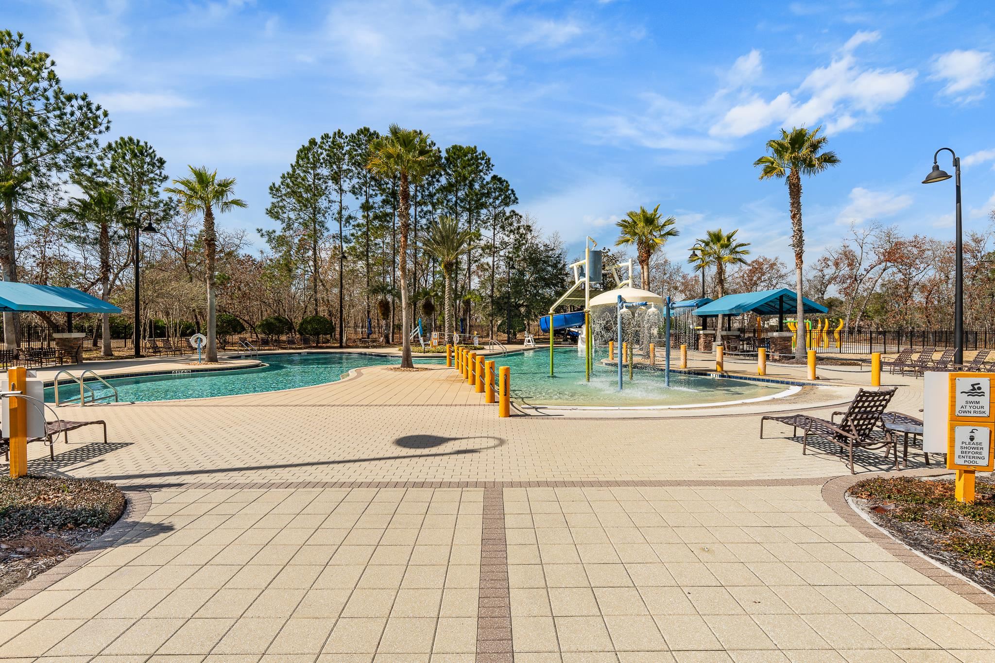 1353 Camp Ridge Lane Middleburg, FL 32068 - Photo 63 of 88 Community pool with a water play area and a patio area