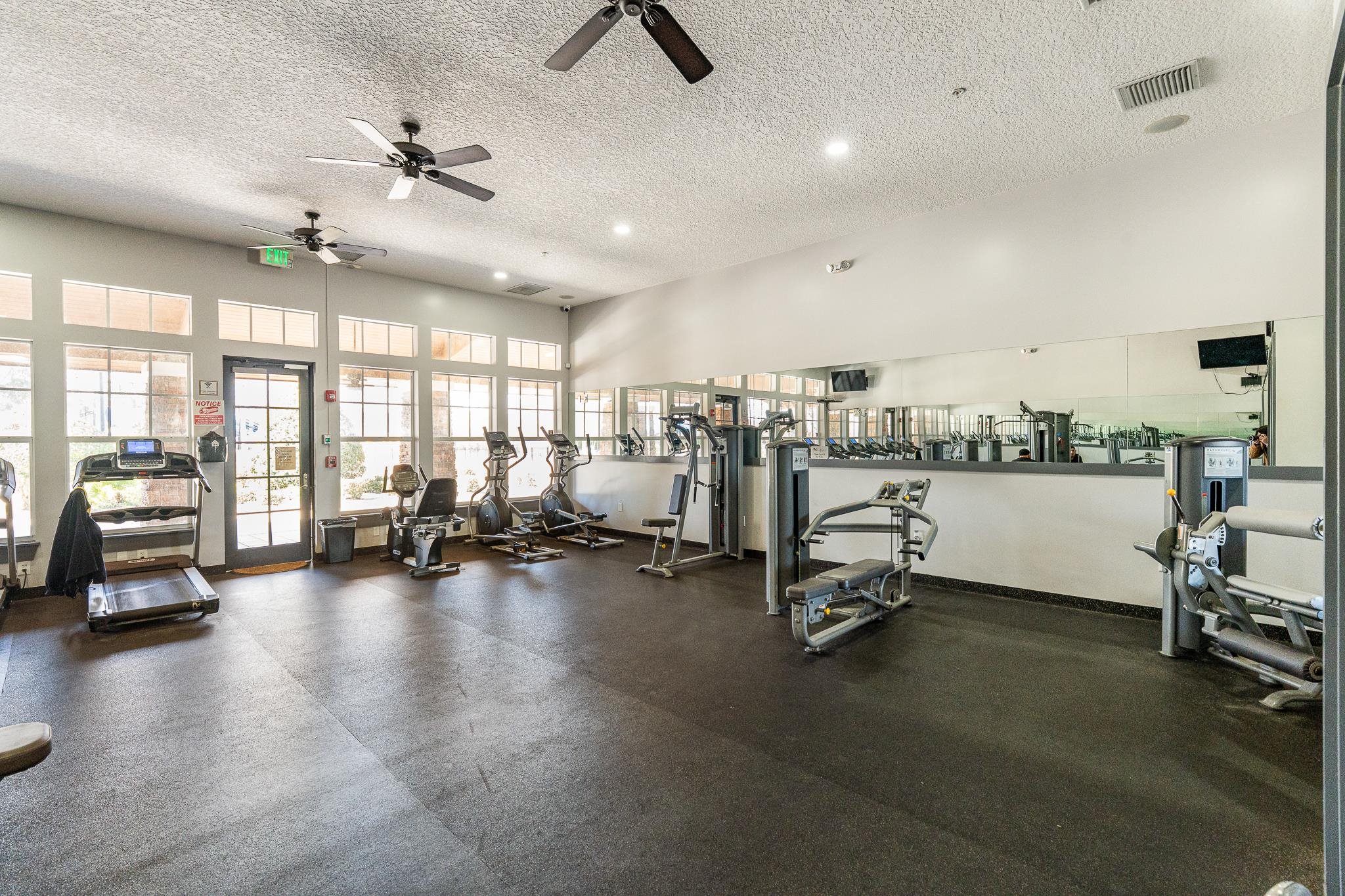 1353 Camp Ridge Lane Middleburg, FL 32068 - Photo 69 of 88 Gym featuring a high textured ceiling and a ceiling fan