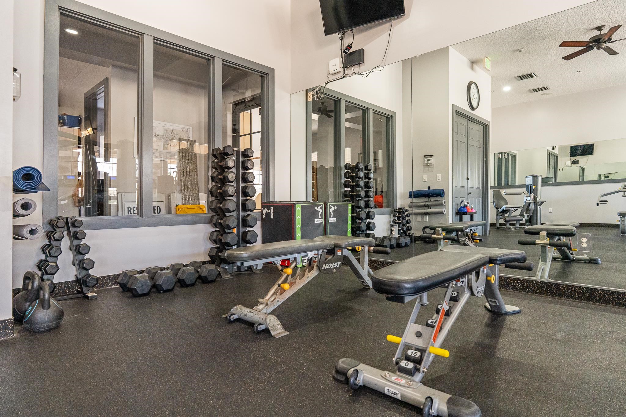 1353 Camp Ridge Lane Middleburg, FL 32068 - Photo 70 of 88 a room with gym equipment and a mirror