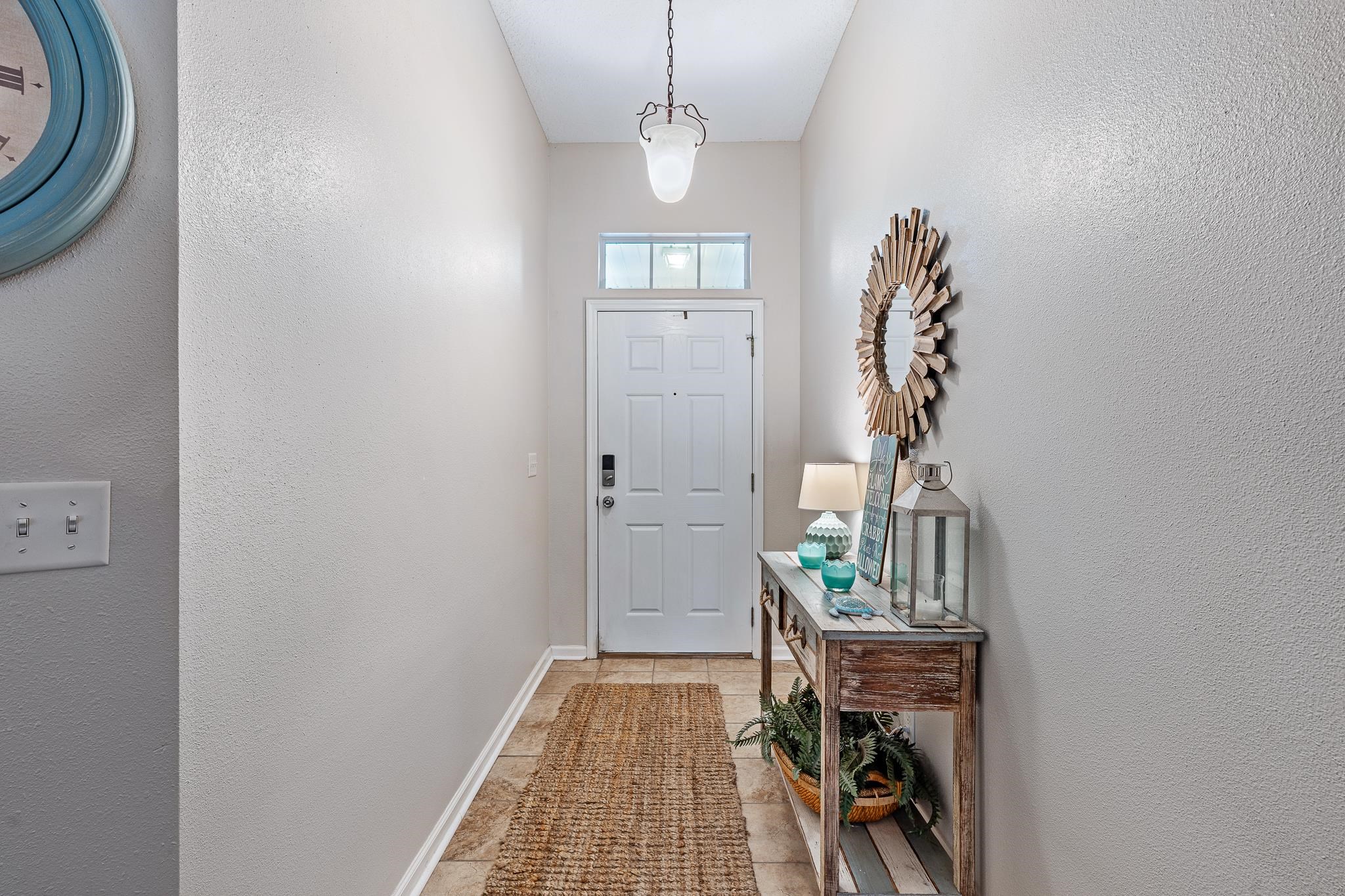 1353 Camp Ridge Lane Middleburg, FL 32068 - Photo 7 of 88 Doorway featuring a textured wall