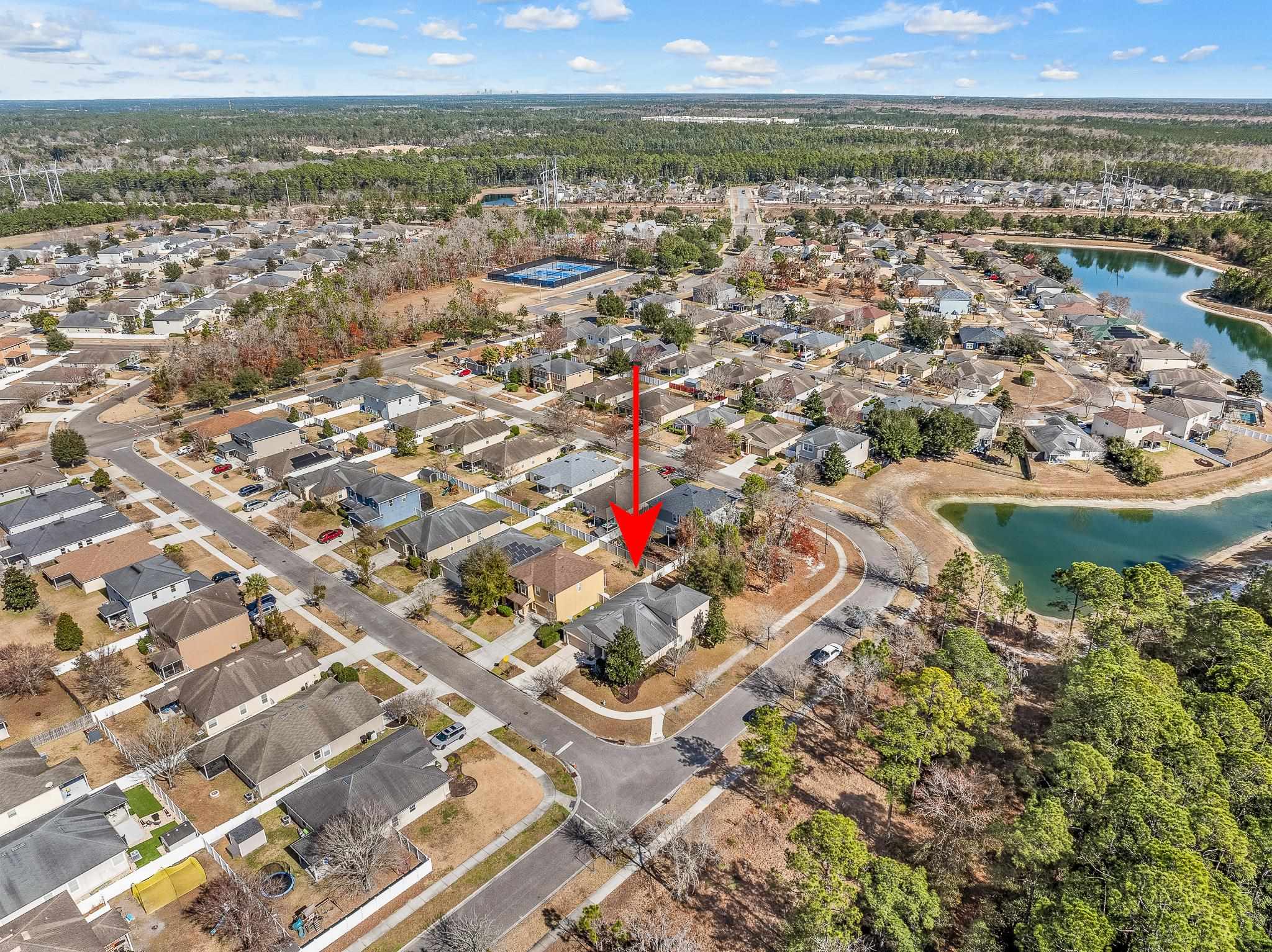 1353 Camp Ridge Lane Middleburg, FL 32068 - Photo 77 of 88 Aerial view of property's location featuring a large body of water and nearby suburban area