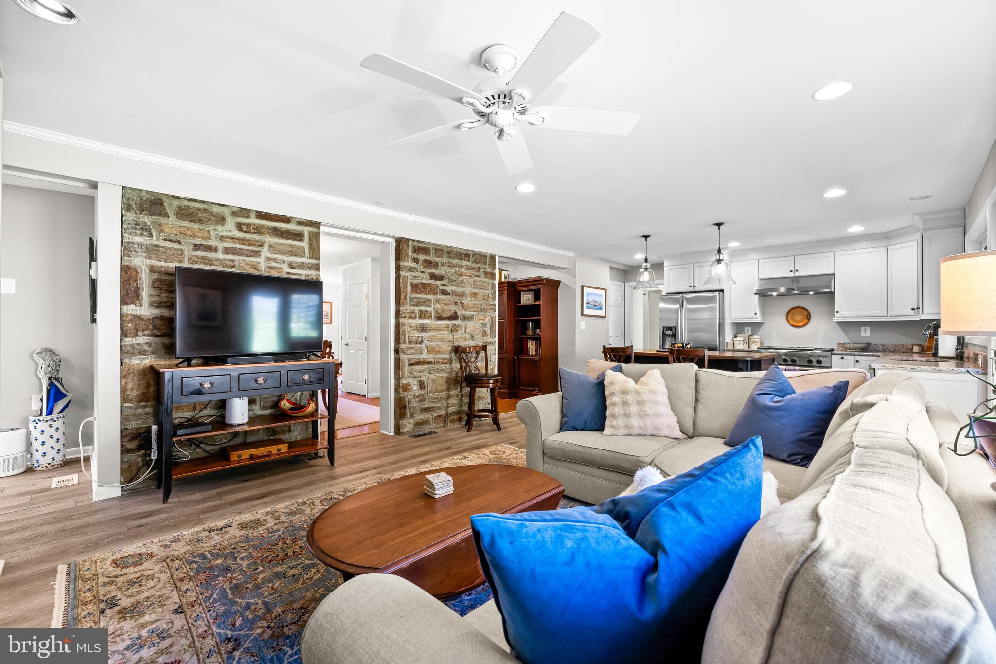 1806 Roland Avenue Ruxton, MD 21204 - Photo 20 of 43 a living room with furniture and a flat screen tv
