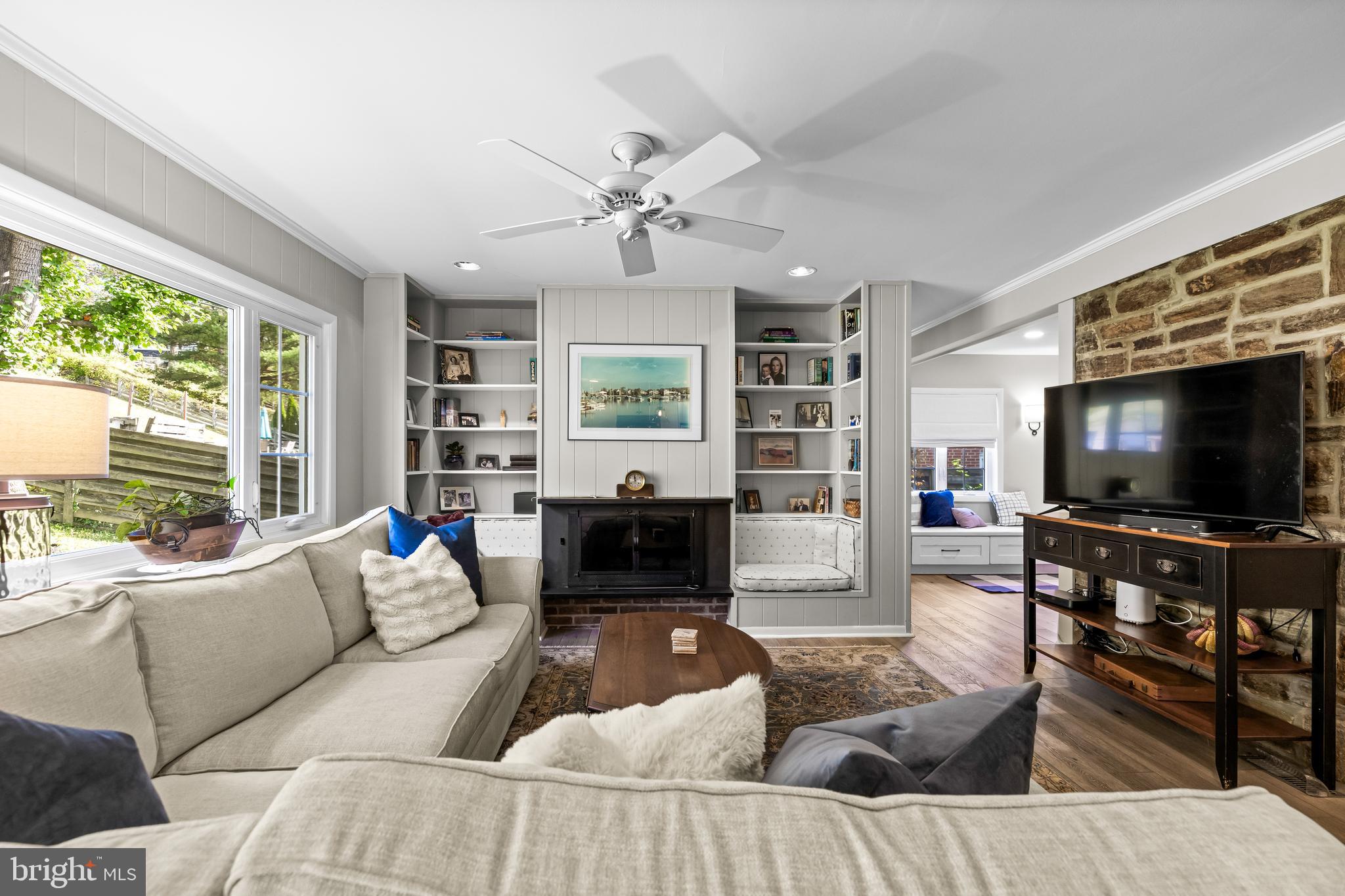 1806 Roland Avenue Ruxton, MD 21204 - Photo 21 of 43 a living room with furniture and a flat screen tv