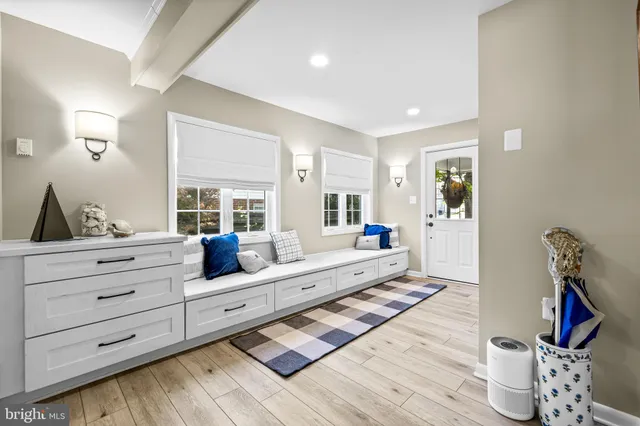 a living room with furniture and window