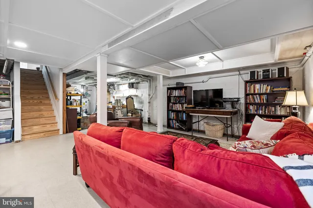 a view of house with outdoor seating yard and swimming pool