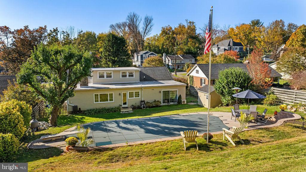 1806 Roland Avenue Ruxton, MD 21204 - Photo 37 of 43 a view of house with outdoor seating yard and swimming pool