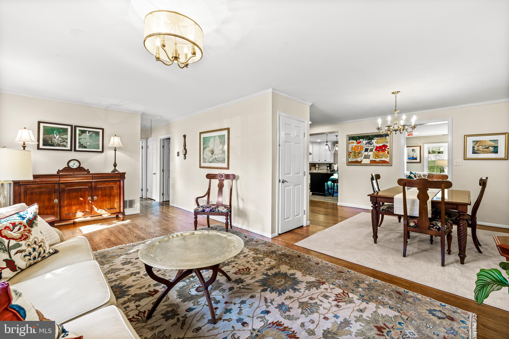 1806 Roland Avenue Ruxton, MD 21204 - Photo 6 of 43 a living room with furniture a rug and a window