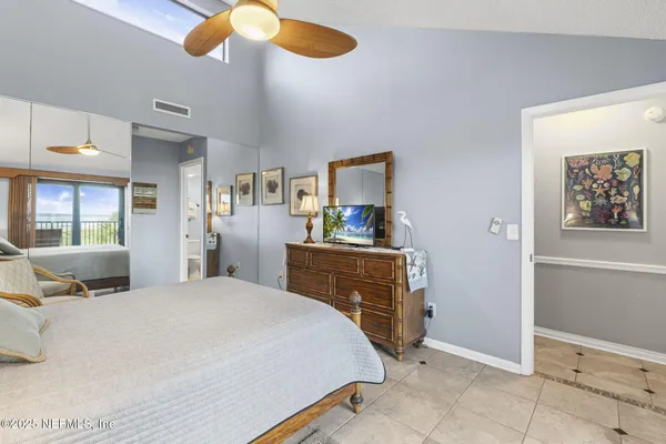 a view of a two chairs in the balcony