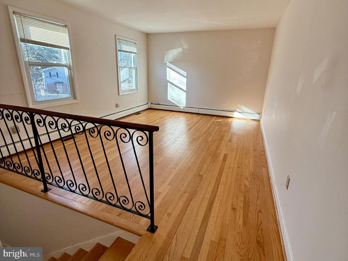 130 Brent Road Arnold, MD 21012 - Photo 4 of 8 Upper level family room with hardwood floors