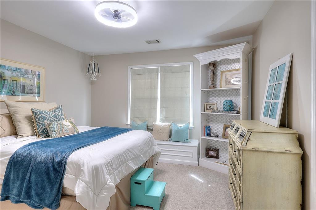 2018 Paper Birch Cove Grayson, GA 30017 - Photo 15 of 48 a bedroom with a bed and a cabinets