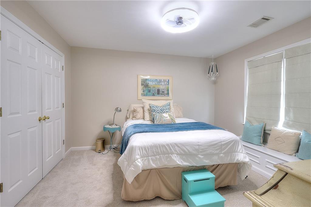 2018 Paper Birch Cove Grayson, GA 30017 - Photo 16 of 48 a bedroom with a bed and window