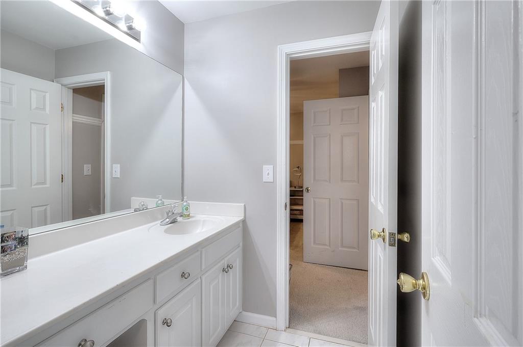 2018 Paper Birch Cove Grayson, GA 30017 - Photo 19 of 48 a bathroom with a double vanity sink mirror and