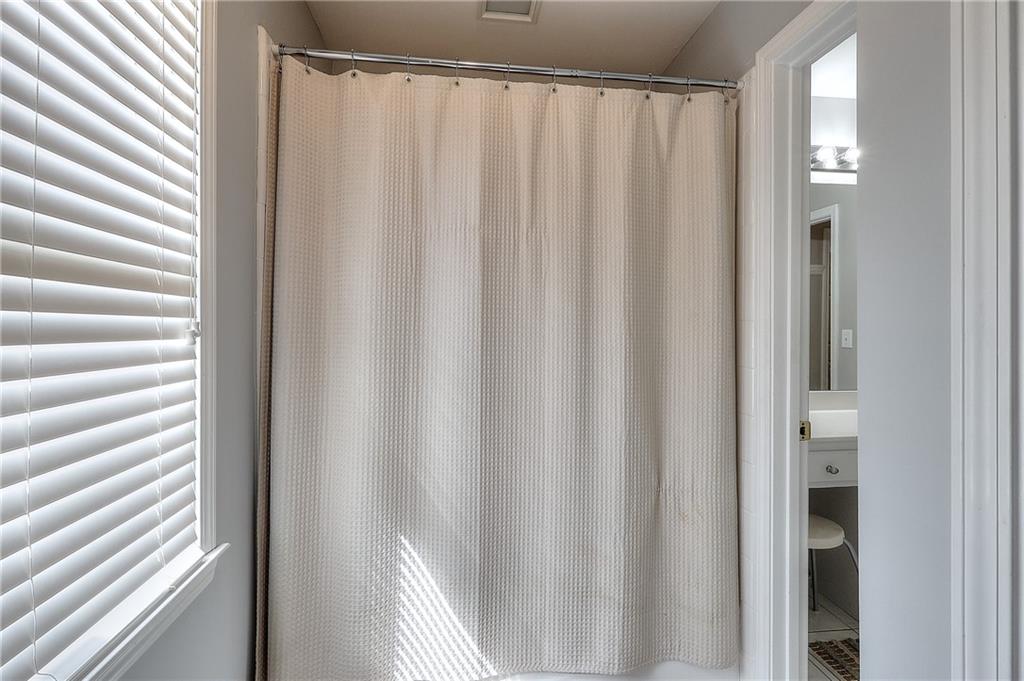 2018 Paper Birch Cove Grayson, GA 30017 - Photo 20 of 48 a view of a bathroom with a shower curtain and a curtain
