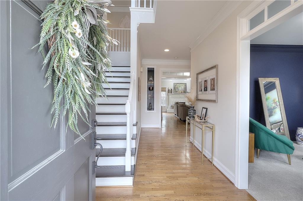 2018 Paper Birch Cove Grayson, GA 30017 - Photo 2 of 48 a view of entryway and hall with wooden floor