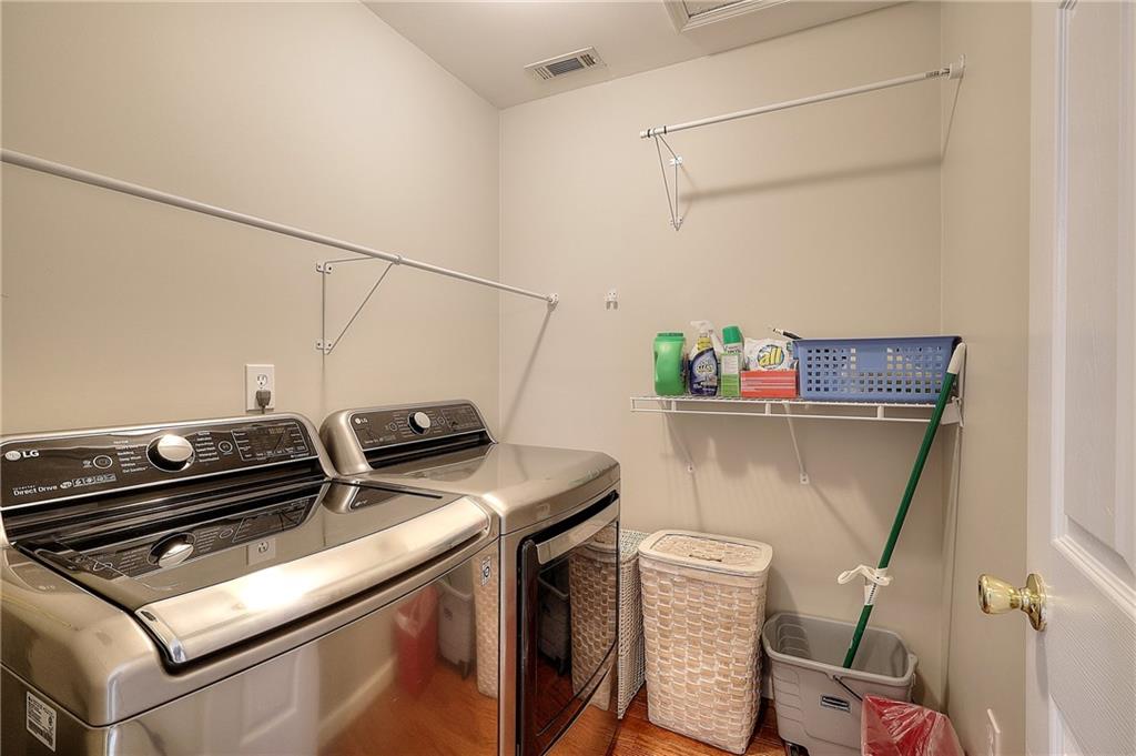 2018 Paper Birch Cove Grayson, GA 30017 - Photo 22 of 48 a view of storage and utility room with washer and dryer