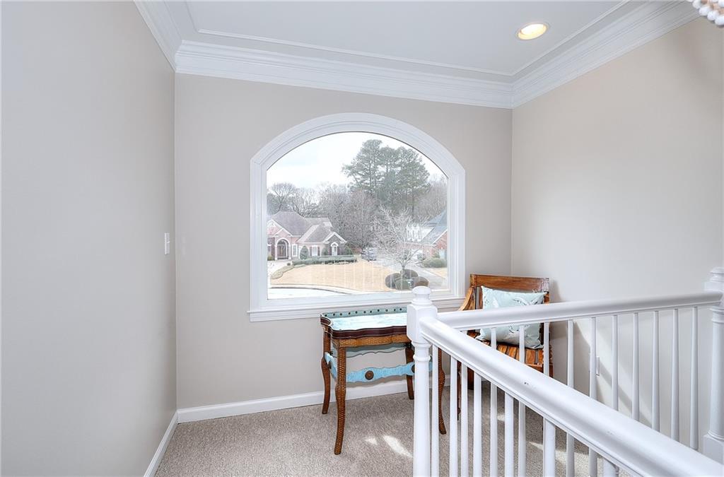 2018 Paper Birch Cove Grayson, GA 30017 - Photo 30 of 48 a view of a hallway with an empty room and wooden floor