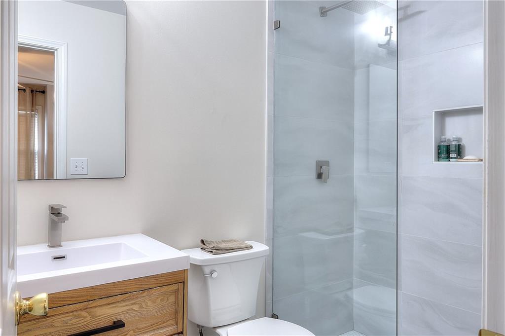 2018 Paper Birch Cove Grayson, GA 30017 - Photo 33 of 48 a bathroom with a sink toilet and shower