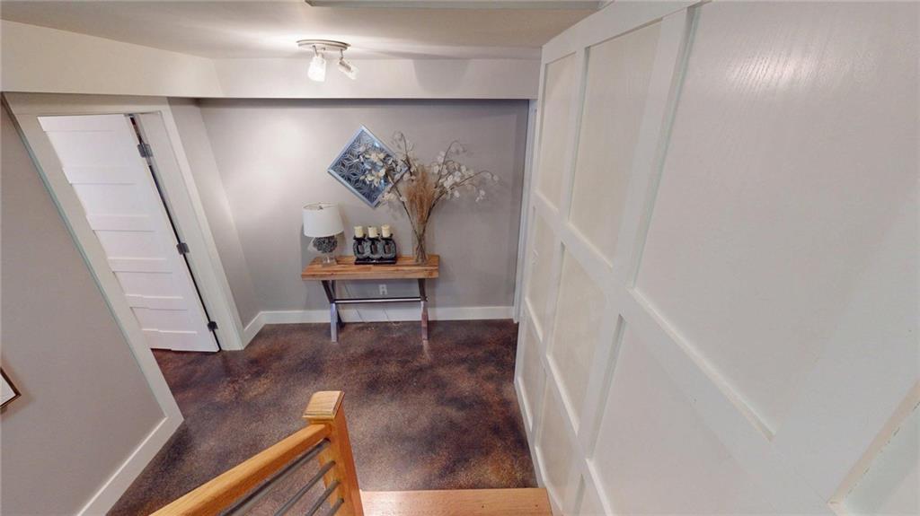 2018 Paper Birch Cove Grayson, GA 30017 - Photo 34 of 48 a view of entryway with stairs and wooden floor
