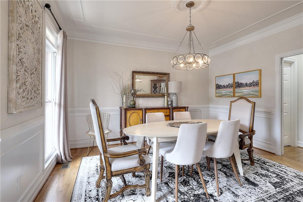 2018 Paper Birch Cove Grayson, GA 30017 - Photo 4 of 48 a view of a dining room with furniture window and wooden floor