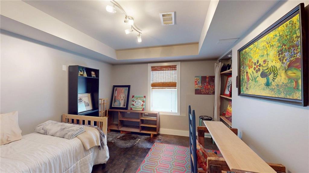 2018 Paper Birch Cove Grayson, GA 30017 - Photo 43 of 48 a bedroom with furniture and a large window