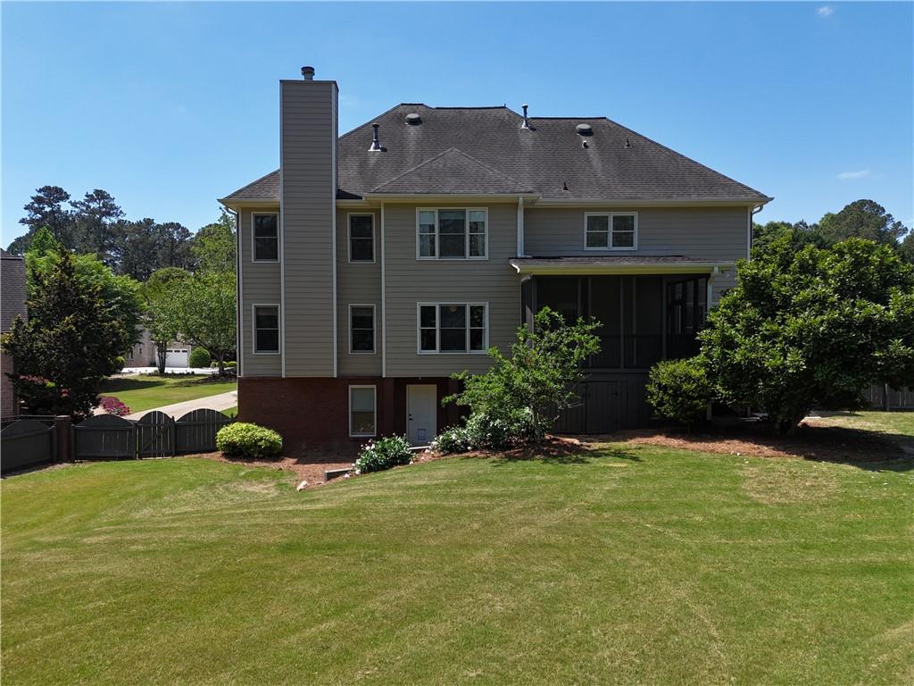 2018 Paper Birch Cove Grayson, GA 30017 - Photo 47 of 48 a front view of house with yard and green space