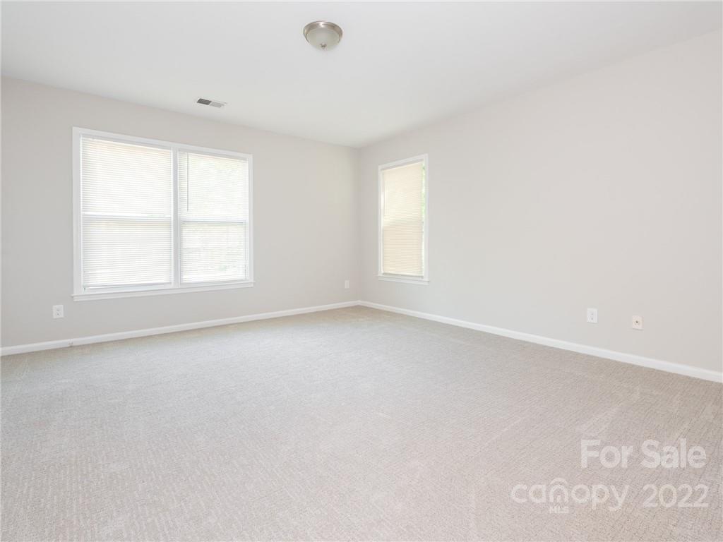 826 McAlway Road Charlotte, NC 28211 - Photo 11 of 30 an empty room with a window